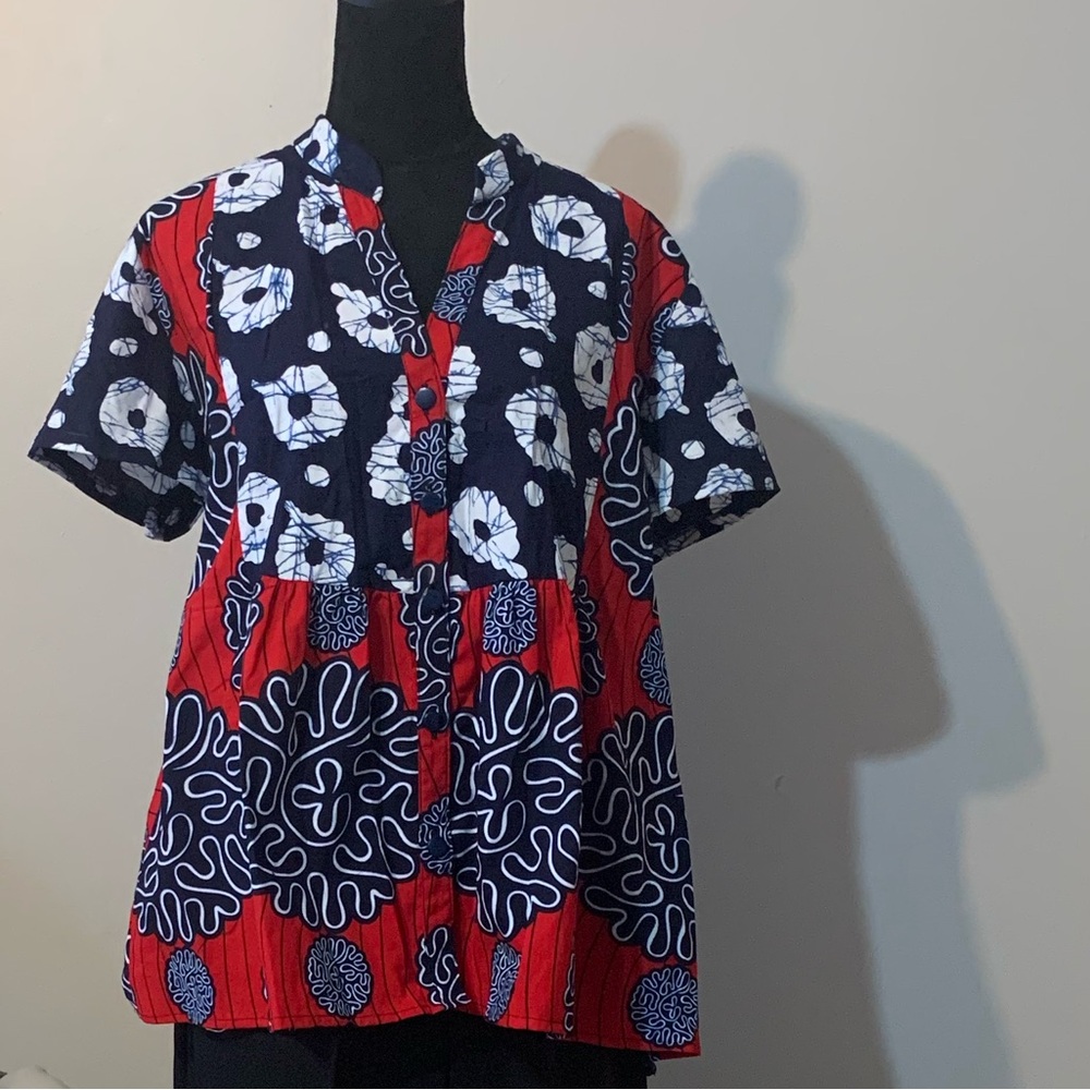 African Print Blouse

Dorma’s Couture 
REASONABLE OFFERS ACCEPTED